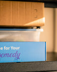 Remedy DIY Pest Control shipping box displayed on shelf in garage